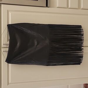 Chelsea & Theodore faux leather fringe skirts.  Size medium, black